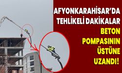 Afyonkarahisar’da tehlikeli dakikalar: Beton pompasının üstüne uzandı!