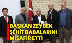 Başkan Zeybek, şehit babalarını misafir etti