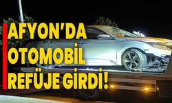 Afyonkarahisar’da otomobil refüje girdi!