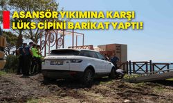 Asansör yıkımına karşı lüks cipini barikat yaptı!