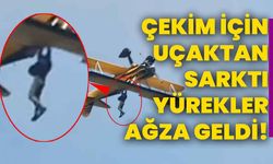 Çekim için uçaktan sarktı, yürekler ağza geldi!