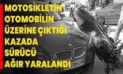 Motosikletin otomobilin üzerine çıktığı kazada sürücü ağır yaralandı