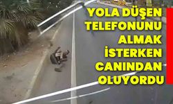 Yola düşen telefonunu almak isterken canından oluyordu