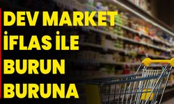 Dev market iflas ile burun buruna