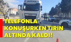 Telefonla konuşurken tırın altında kaldı!