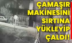 Çamaşır makinesini sırtına yükleyip çaldı!