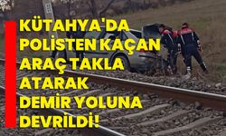 Kütahya'da polisten kaçan araç takla atarak demir yoluna devrildi!