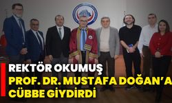 Rektör Okumuş, Prof. Dr. Mustafa Doğan’a Cübbe Giydirdi