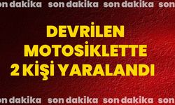 Devrilen motosiklette 2 kişi yaralandı