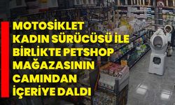 Motosiklet kadın sürücüsü ile birlikte petshop mağazasının camından içeriye daldı