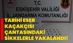 Tarihi eser kaçakçısı çantasındaki sikkelerle yakalandı!