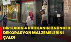 Bir kadın 4 dükkanın önündeki dekorasyon malzemelerini çaldı