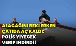 Alacağını beklerken çatıda aç kaldı: Polis yiyecek verip indirdi!