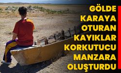 Gölde karaya oturan kayıklar korkutucu manzara oluşturdu