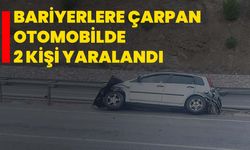 Bariyerlere çarpan otomobilde 2 kişi yaralandı