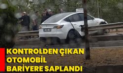 Kontrolden Çıkan Otomobil Bariyere Saplandı