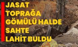JASAT toprağa gömülü halde sahte lahit buldu