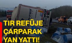 Tır refüje çarparak yan yattı!