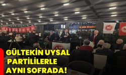Gültekin Uysal partililerle aynı sofrada!