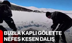 Buzla kaplı gölette nefes kesen dalış
