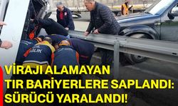 Virajı alamayan tır bariyerlere saplandı: Sürücü yaralandı