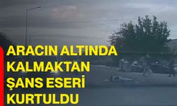 Aracın altında kalmaktan şans eseri kurtuldu