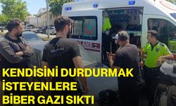 Kendisini durdurmak isteyenlere biber gazı sıktı
