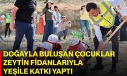 Doğayla buluşan çocuklar zeytin fidanlarıyla yeşile katkı yaptı