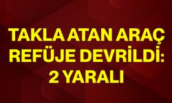 Takla atan araç refüje devrildi: 2 yaralı