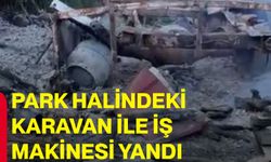 Park halindeki karavan ile iş makinesi yandı