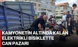 Kamyonetin altında kalan elektrikli bisiklette can pazarı