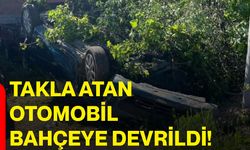 Takla atan otomobil bahçeye devrildi!
