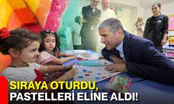 Sıraya oturdu, pastelleri eline aldı!