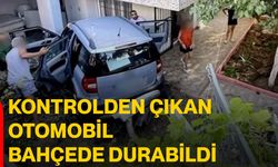 Kontrolden çıkan otomobil bahçede durabildi