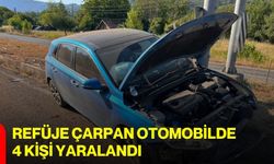 Refüje çarpan otomobilde 4 kişi yaralandı