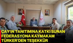 Çay'ın tanıtımına katkı sunan federasyona Kaymakam Türker'den teşekkür