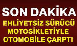 Ehliyetsiz sürücü, motosikletiyle otomobile çarptı: 2 yaralı