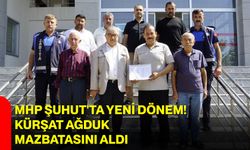 MHP Şuhut'ta yeni dönem! Kürşat Ağduk mazbatasını aldı