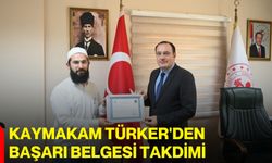 Kaymakam Türker'den başarı belgesi takdimi