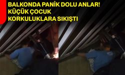 Balkonda panik dolu anlar! Küçük çocuk korkuluklara sıkıştı