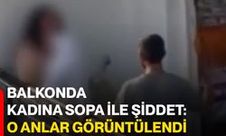 Balkonda kadına sopa ile şiddet: O anlar görüntülendi