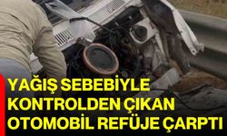 Yağış sebebiyle kontrolden çıkan otomobil refüje çarptı