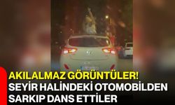 Akılalmaz görüntüler! Seyir halindeki otomobilden sarkıp dans ettiler