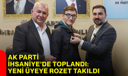 AK Parti İhsaniye’de toplandı: Yeni üyeye rozet takıldı