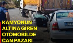Kamyonun altına giren otomobilde can pazarı