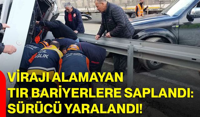 Virajı alamayan tır bariyerlere saplandı: Sürücü yaralandı