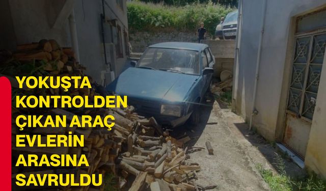 Yokuşta kontrolden çıkan araç evlerin arasına savruldu