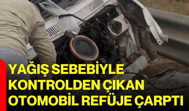 Yağış sebebiyle kontrolden çıkan otomobil refüje çarptı
