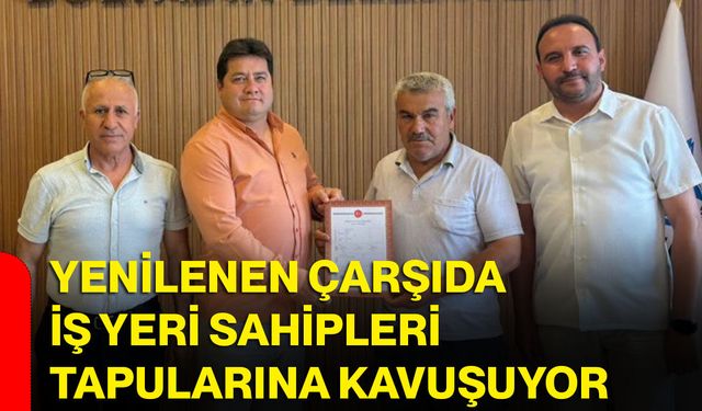 Yenilenen çarşıda iş yeri sahipleri tapularına kavuşuyor