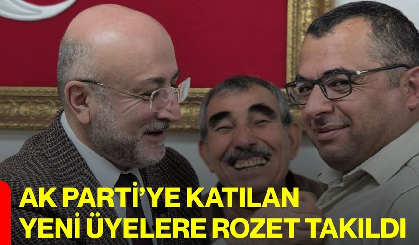 AK Parti’ye Katılan yeni üyelere rozet takıldı